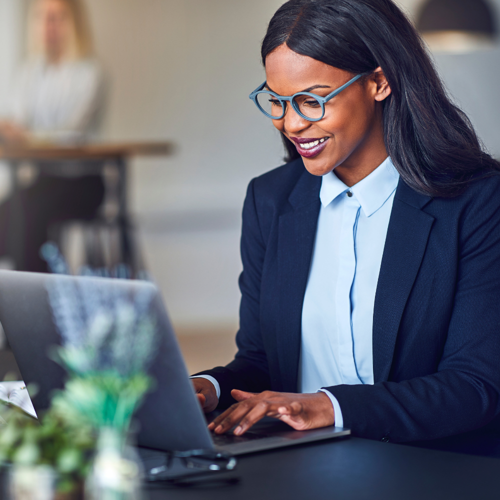 smiling lawyer on laptop