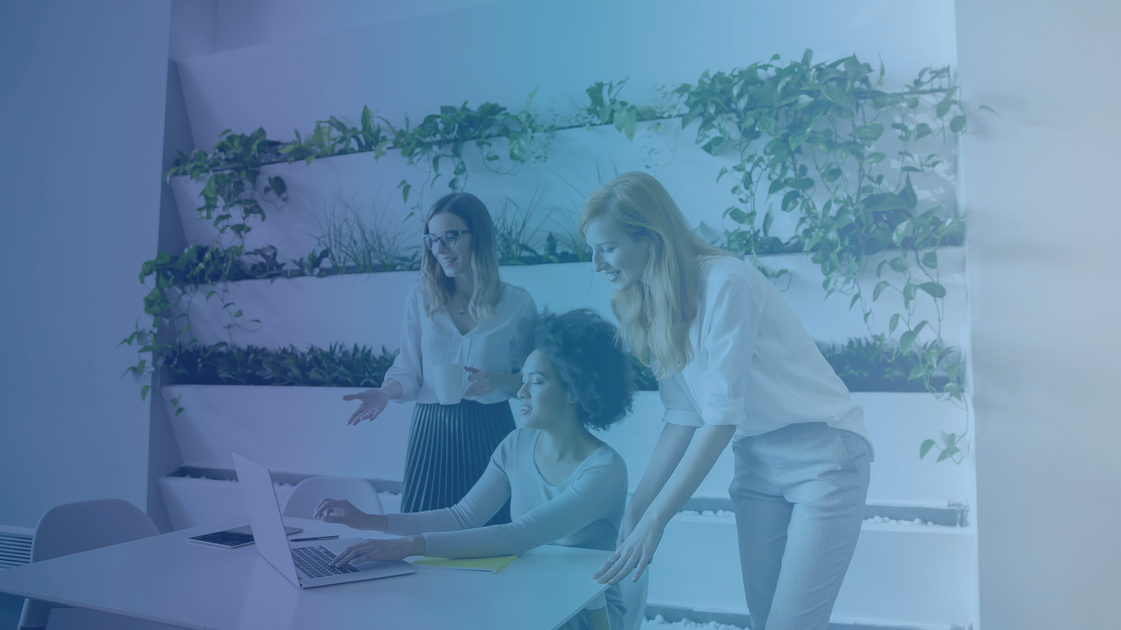 How to Mitigate Risks in Corporate Mergers and Acquisitions post women working at desk