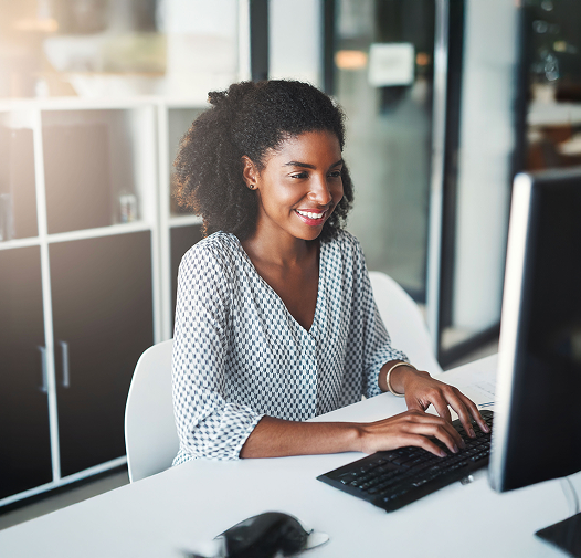 female professional working on laptop with Law Student Resources
